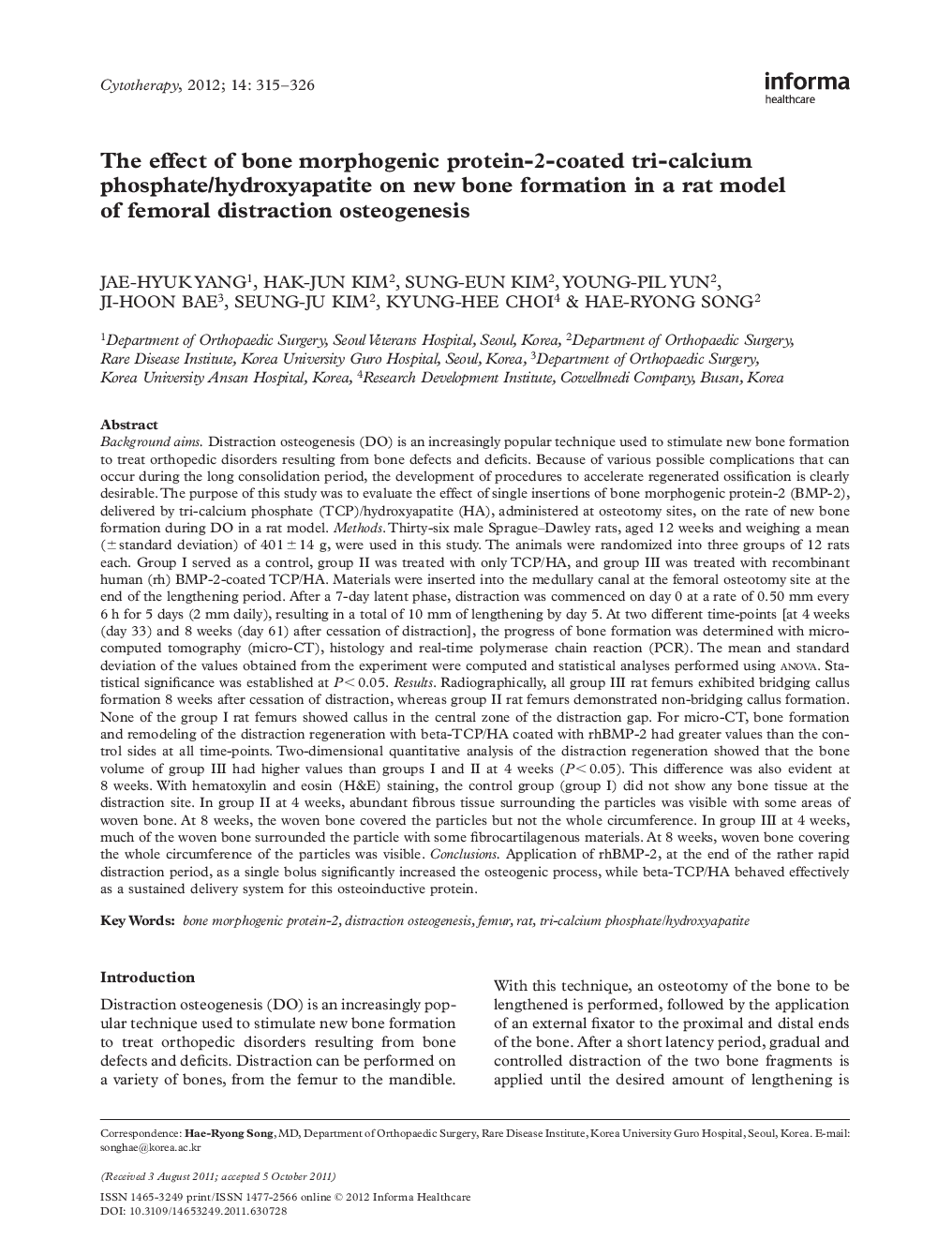 The effect of bone morphogenic protein-2-coated tri-calcium phosphate/hydroxyapatite on new bone formation in a rat model of femoral distraction osteogenesis