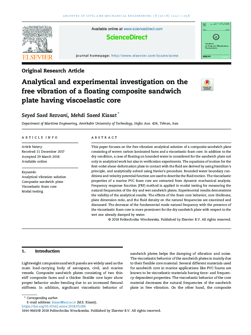 Analytical and experimental investigation on the free vibration of a floating composite sandwich plate having viscoelastic core