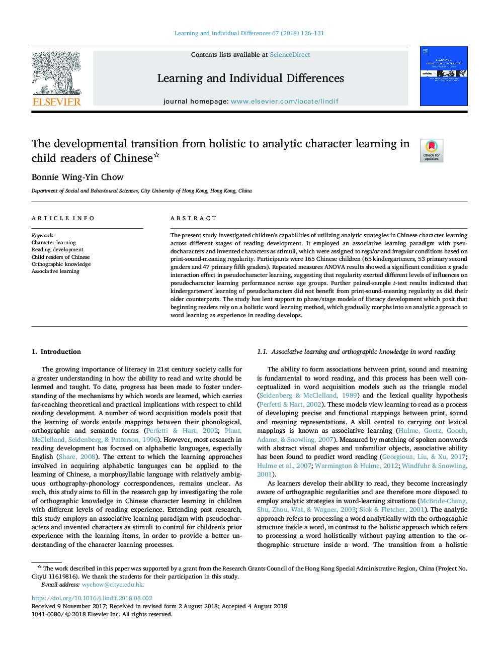 The developmental transition from holistic to analytic character learning in child readers of Chinese