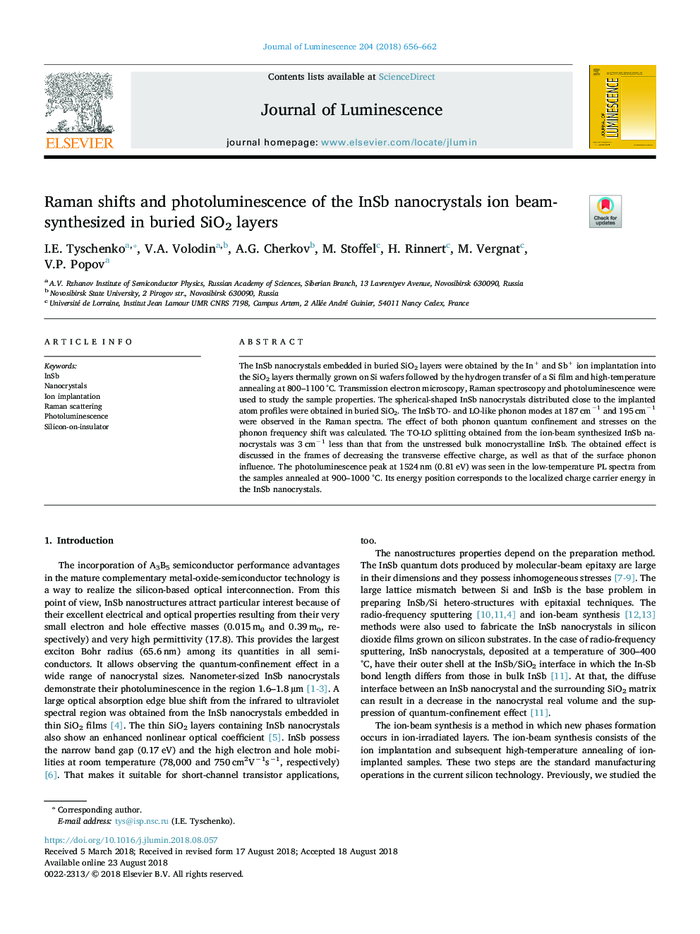 Raman shifts and photoluminescence of the InSb nanocrystals ion beam-synthesized in buried SiO2 layers