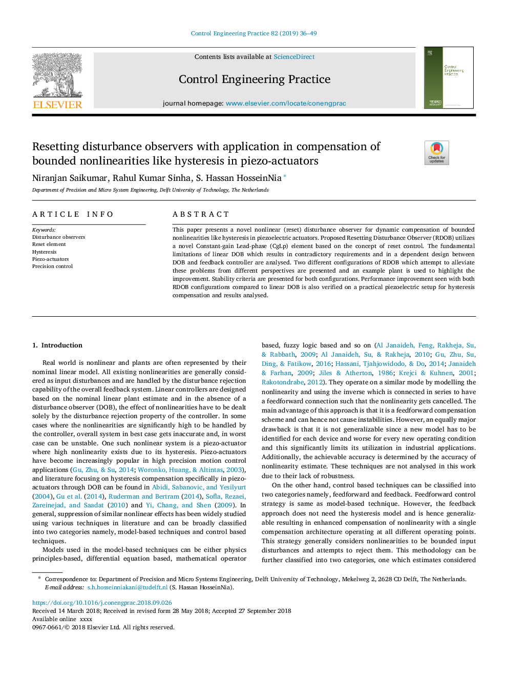 Resetting disturbance observers with application in compensation of bounded nonlinearities like hysteresis in piezo-actuators