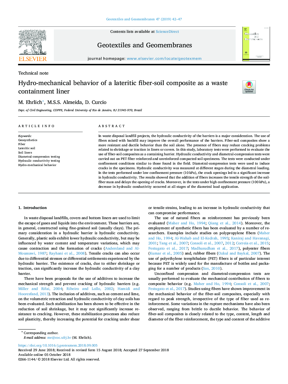 Hydro-mechanical behavior of a lateritic fiber-soil composite as a waste containment liner