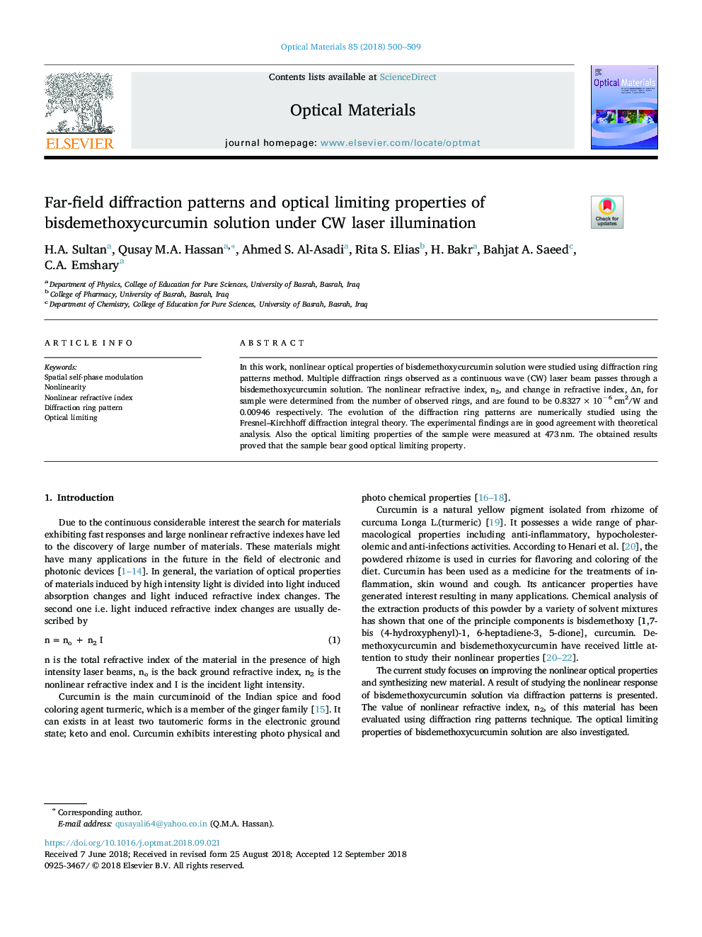 Far-field diffraction patterns and optical limiting properties of bisdemethoxycurcumin solution under CW laser illumination