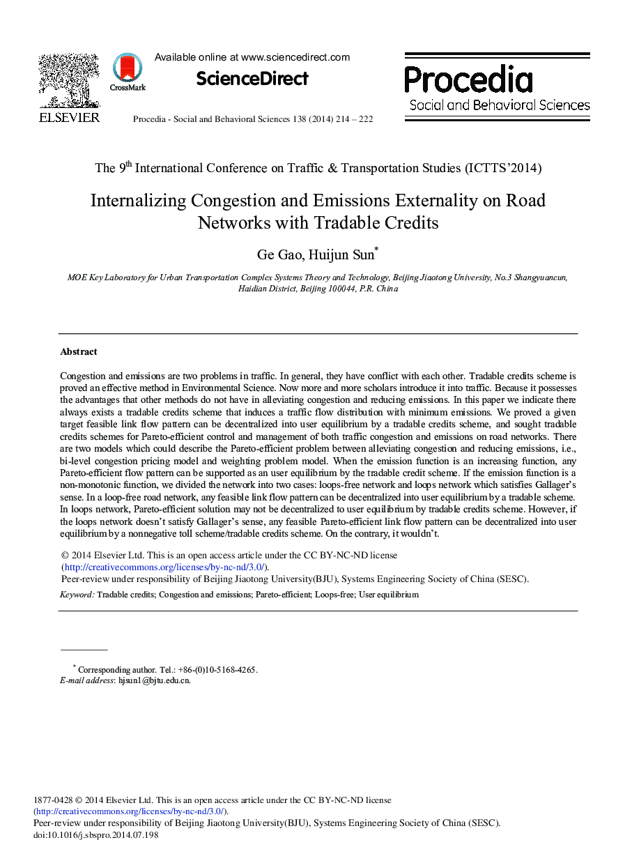 Internalizing Congestion and Emissions Externality on Road Networks with Tradable Credits 