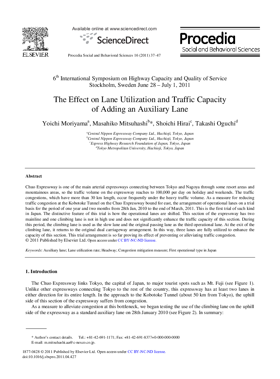 The Effect on Lane Utilization and Traffic Capacity of Adding an Auxiliary Lane