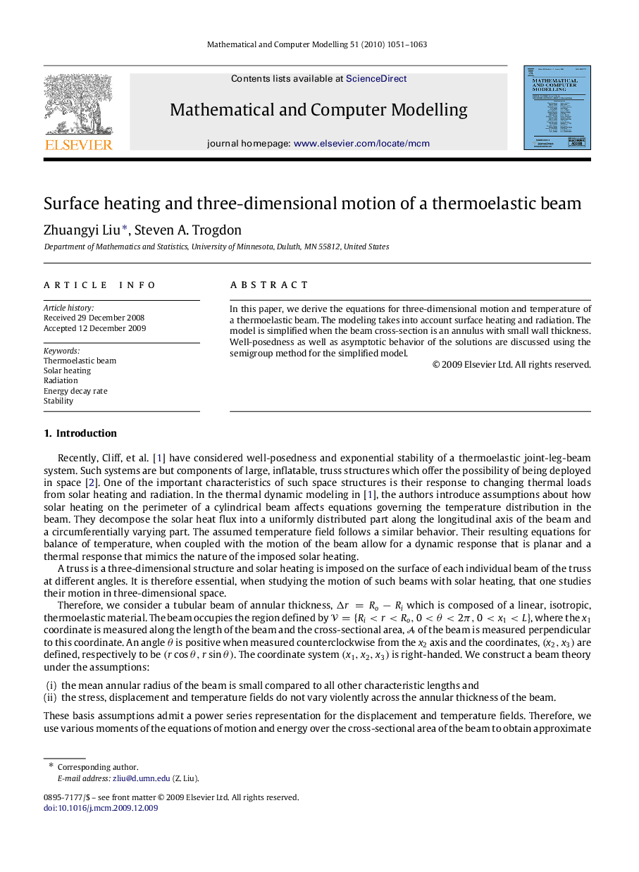 Surface heating and three-dimensional motion of a thermoelastic beam