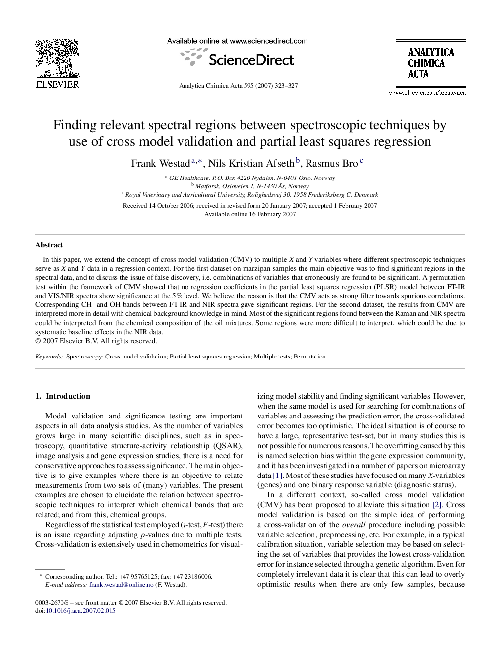 Finding relevant spectral regions between spectroscopic techniques by use of cross model validation and partial least squares regression