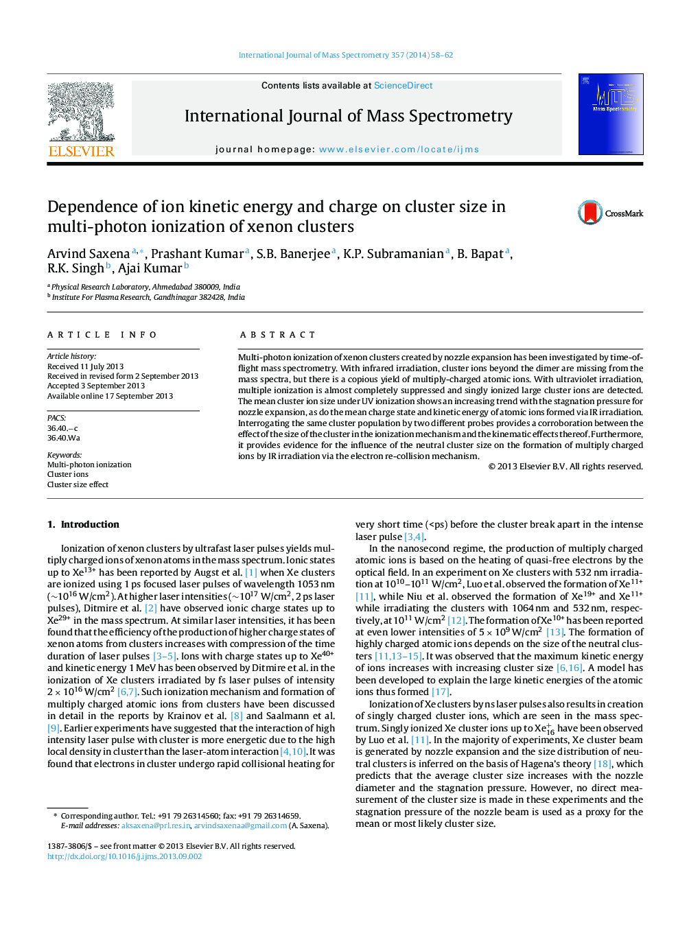 Dependence of ion kinetic energy and charge on cluster size in multi-photon ionization of xenon clusters