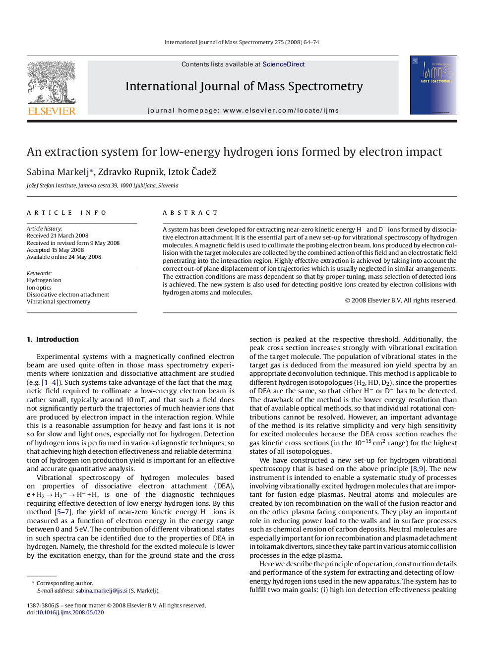 An extraction system for low-energy hydrogen ions formed by electron impact