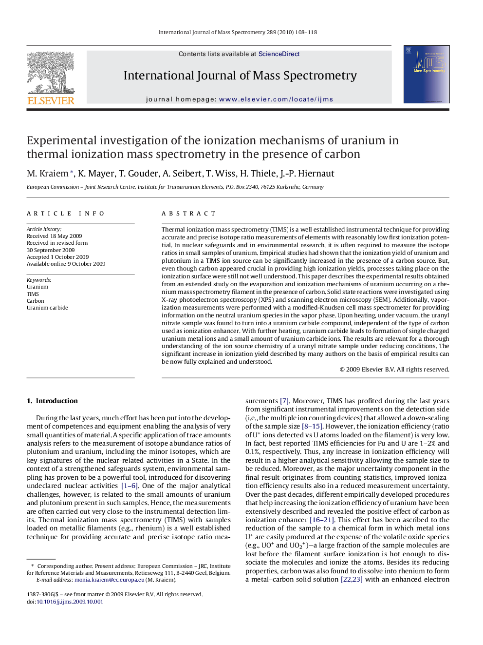 Experimental investigation of the ionization mechanisms of uranium in thermal ionization mass spectrometry in the presence of carbon