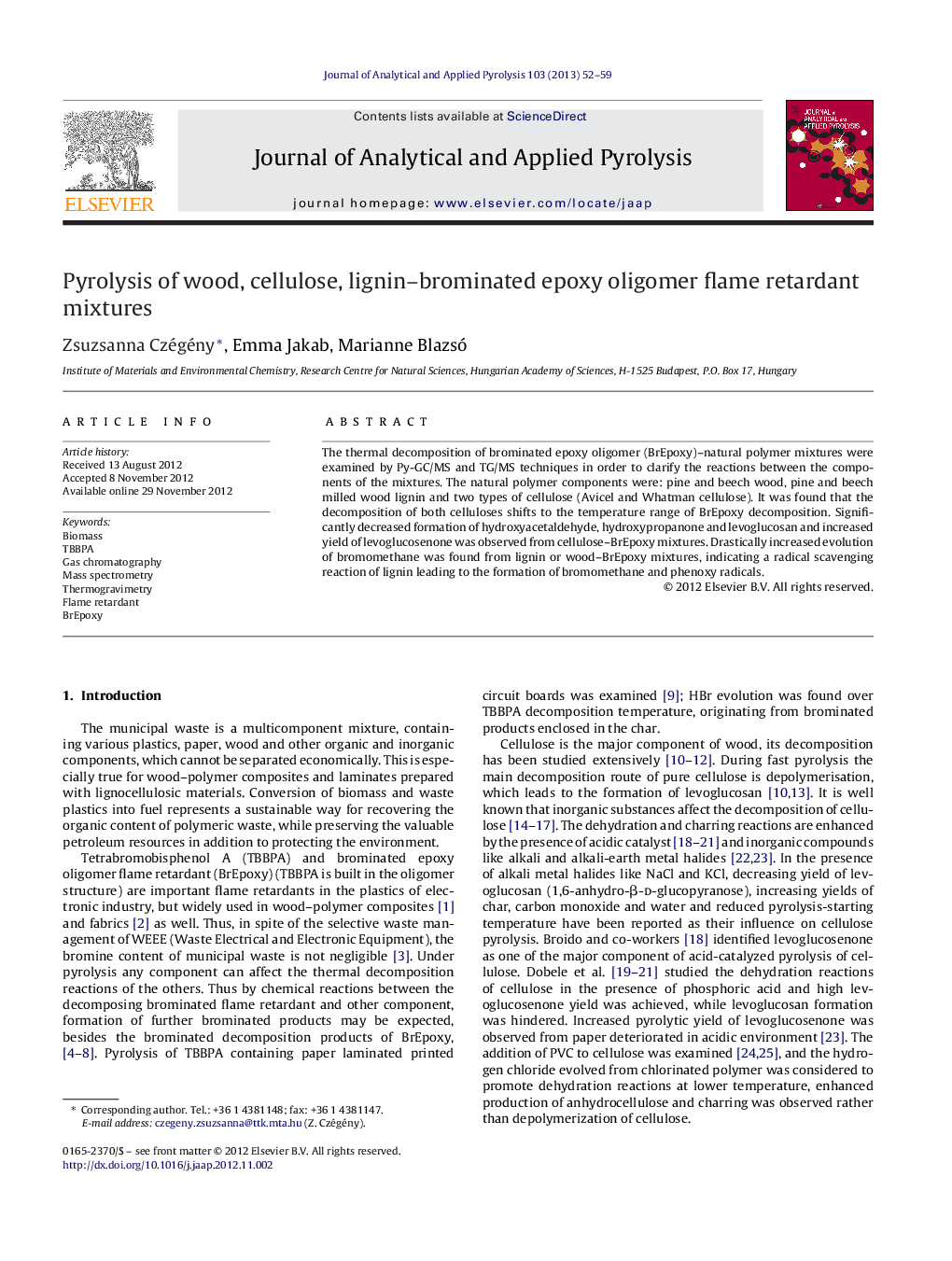 Pyrolysis of wood, cellulose, lignin–brominated epoxy oligomer flame retardant mixtures