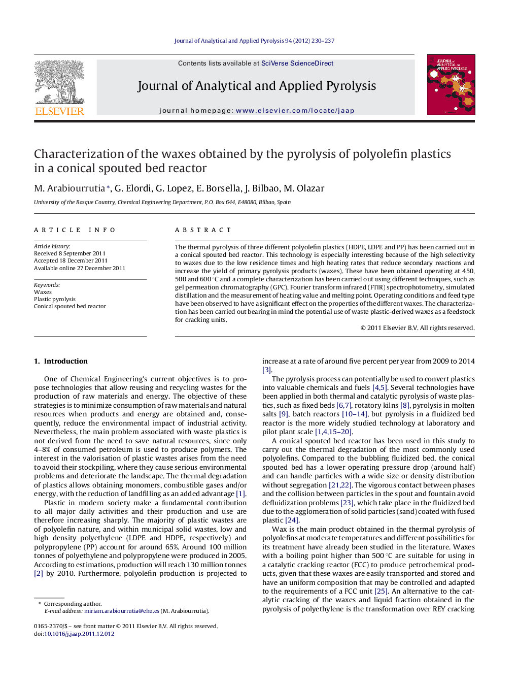 Characterization of the waxes obtained by the pyrolysis of polyolefin plastics in a conical spouted bed reactor