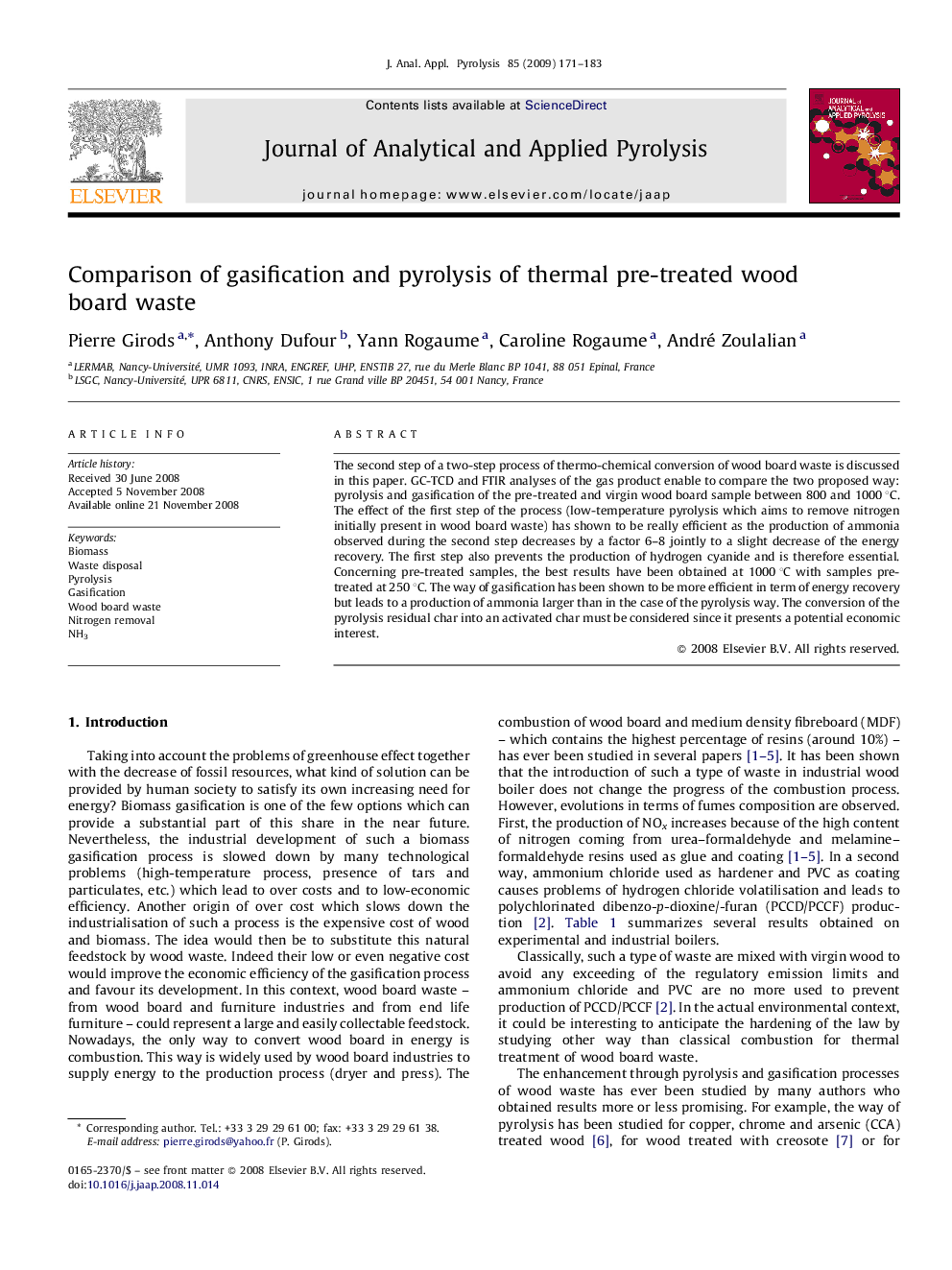 Comparison of gasification and pyrolysis of thermal pre-treated wood board waste