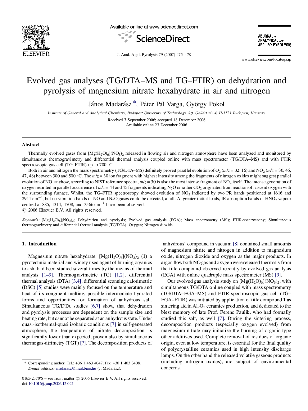 Evolved gas analyses (TG/DTA–MS and TG–FTIR) on dehydration and pyrolysis of magnesium nitrate hexahydrate in air and nitrogen