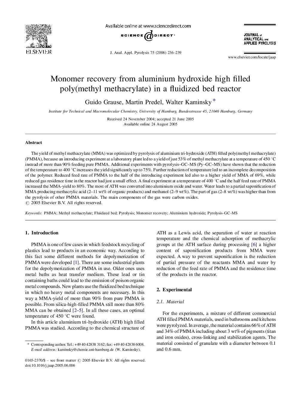 Monomer recovery from aluminium hydroxide high filled poly(methyl methacrylate) in a fluidized bed reactor