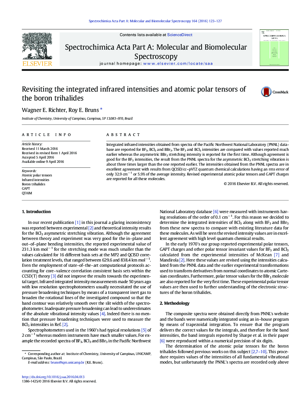 Revisiting the integrated infrared intensities and atomic polar tensors of the boron trihalides