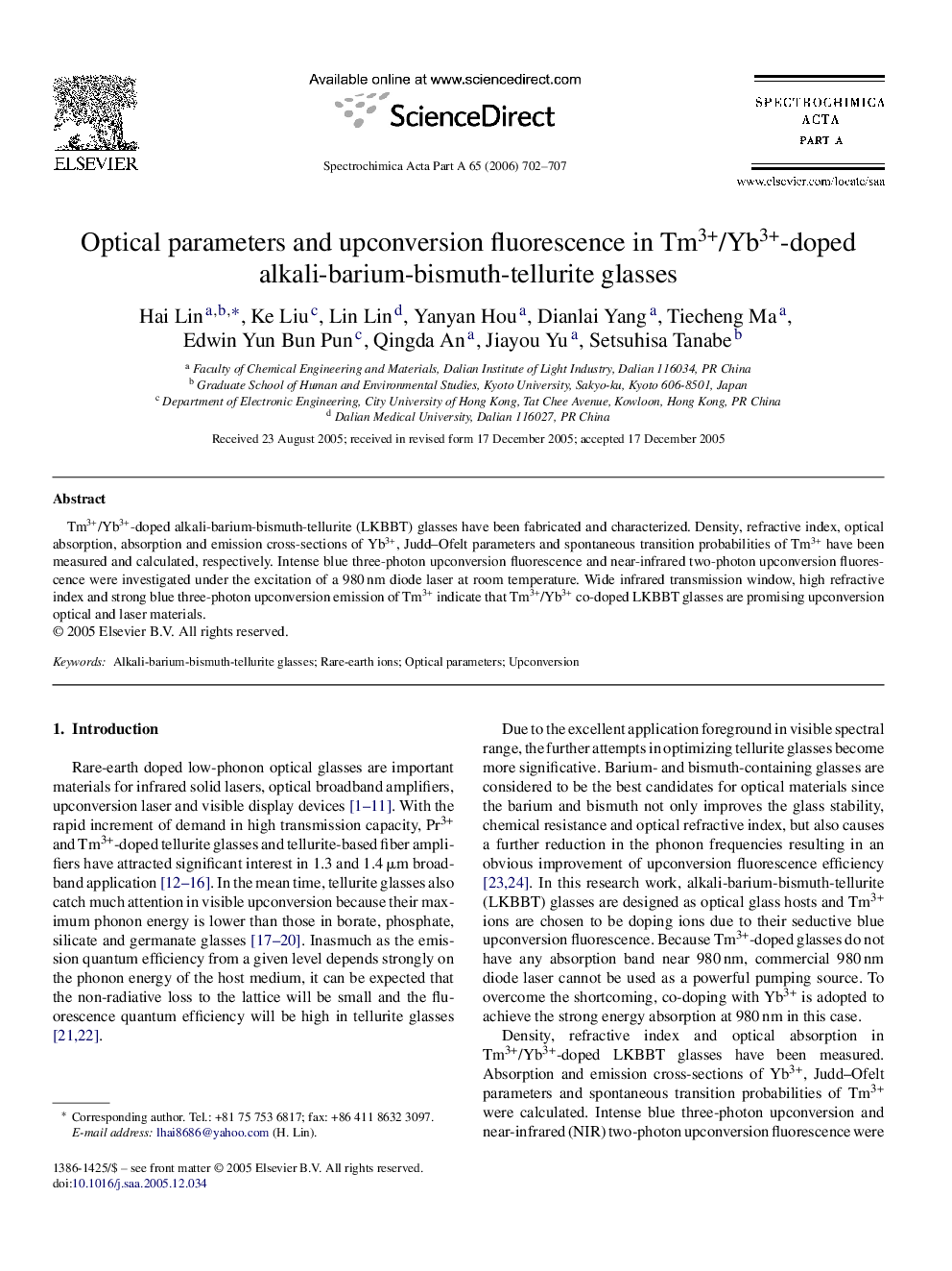 Optical parameters and upconversion fluorescence in Tm3+/Yb3+-doped alkali-barium-bismuth-tellurite glasses