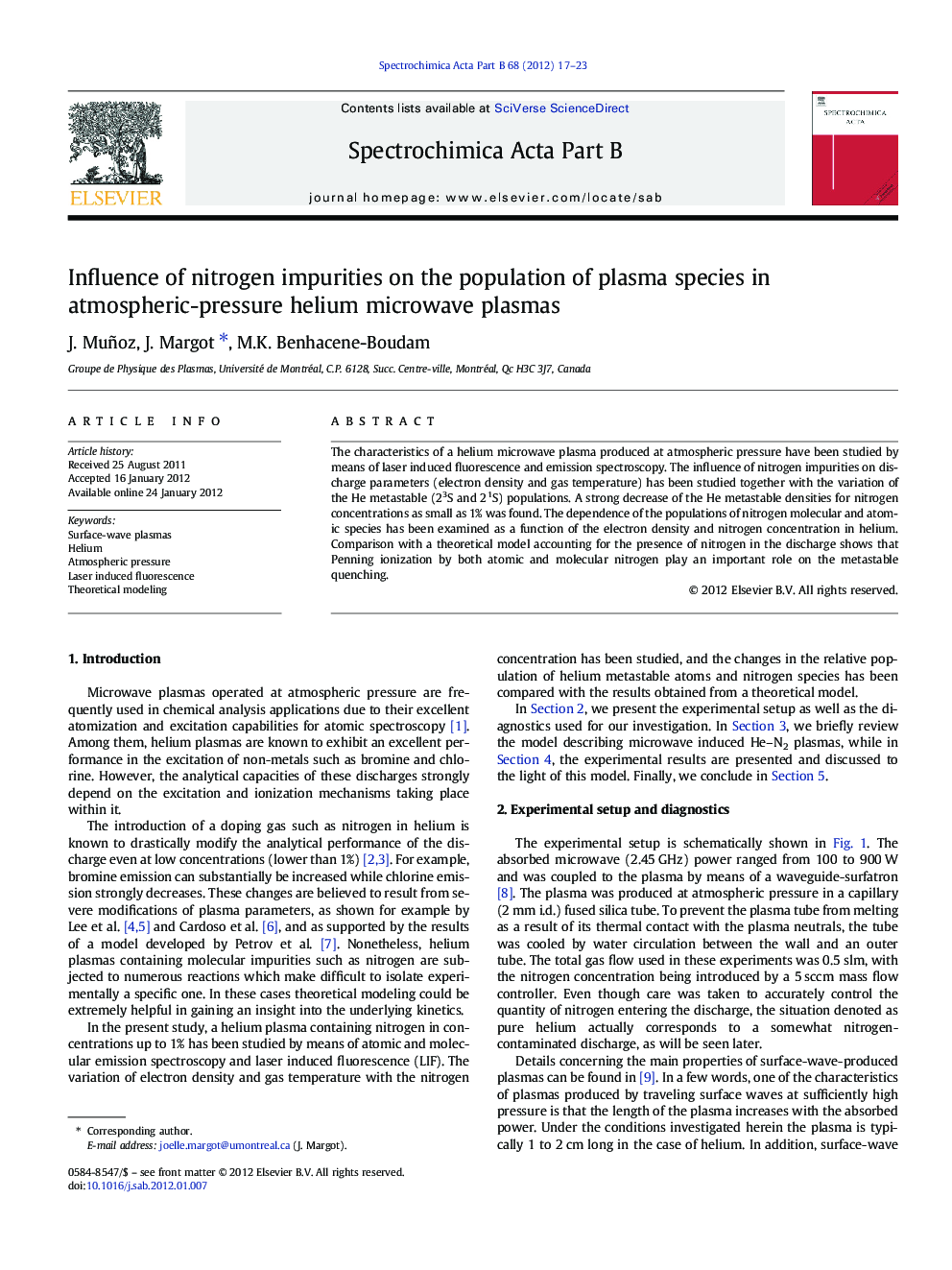 Influence of nitrogen impurities on the population of plasma species in atmospheric-pressure helium microwave plasmas