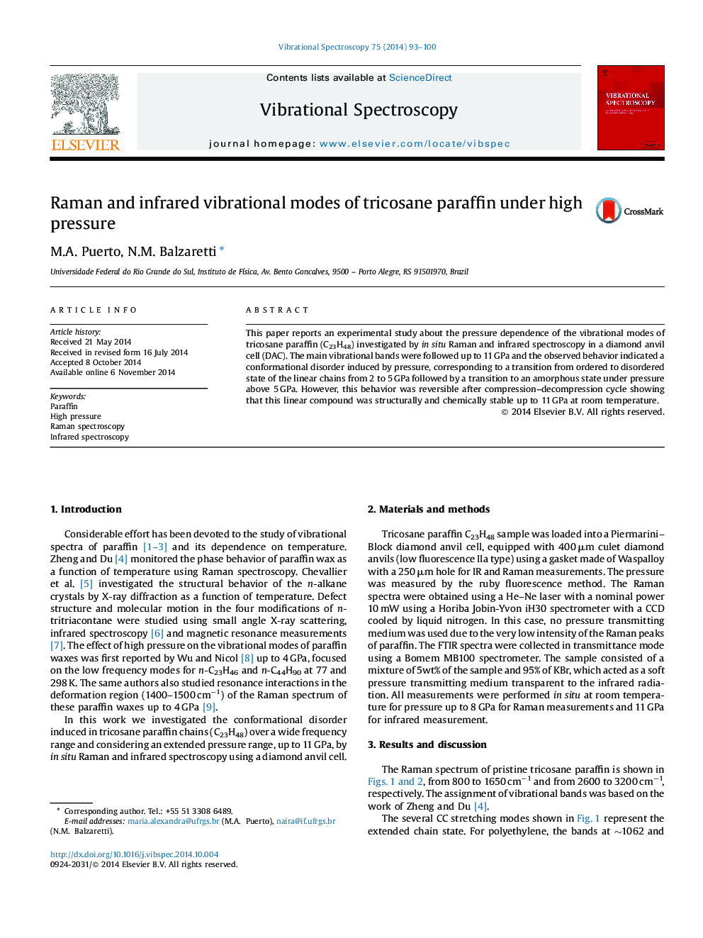 Raman and infrared vibrational modes of tricosane paraffin under high pressure