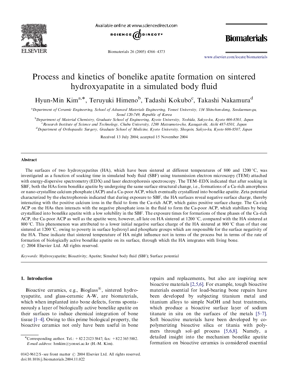 Process and kinetics of bonelike apatite formation on sintered hydroxyapatite in a simulated body fluid