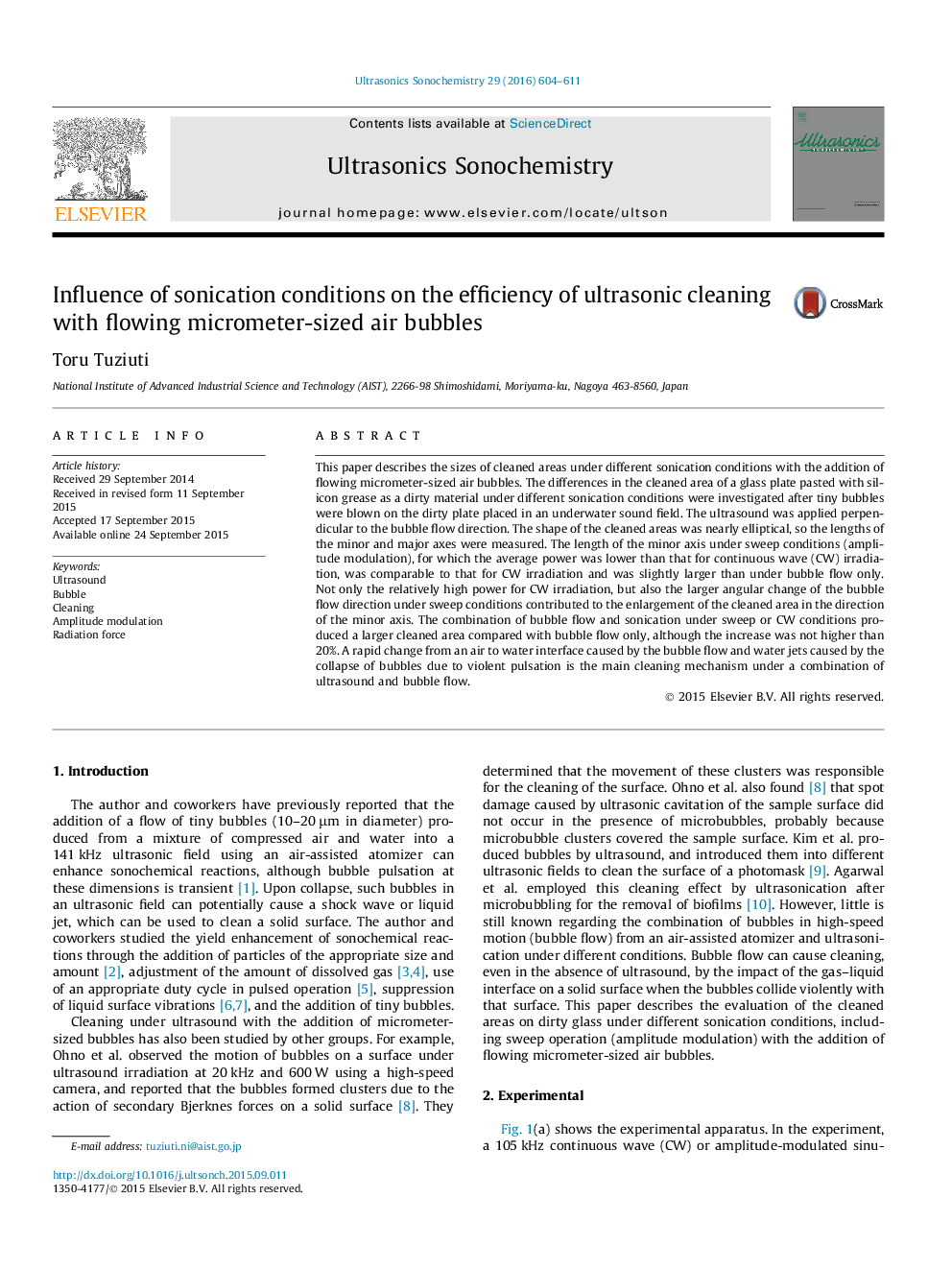 Influence of sonication conditions on the efficiency of ultrasonic cleaning with flowing micrometer-sized air bubbles