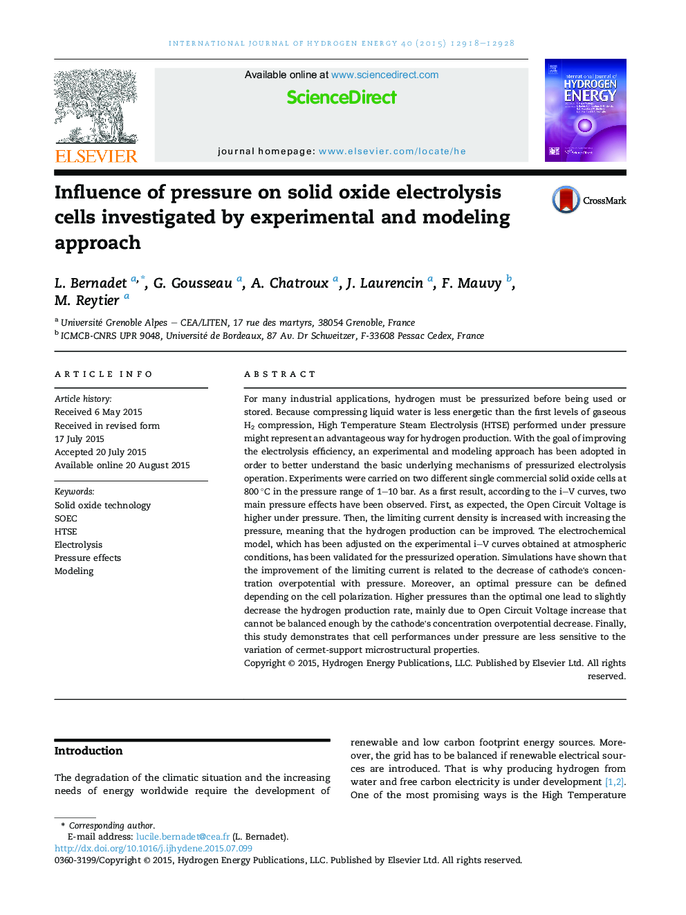 Influence of pressure on solid oxide electrolysis cells investigated by experimental and modeling approach