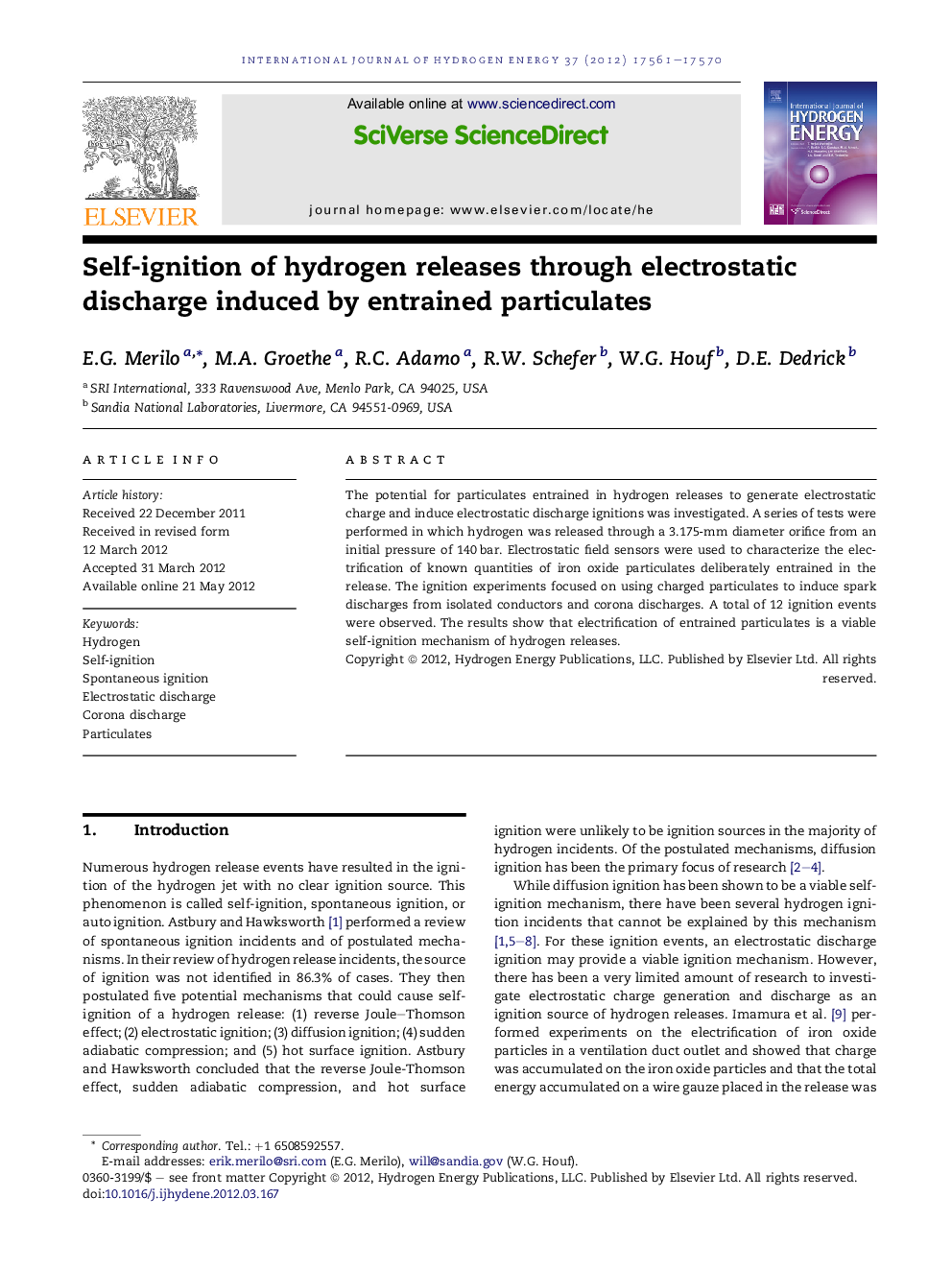 Self-ignition of hydrogen releases through electrostatic discharge induced by entrained particulates