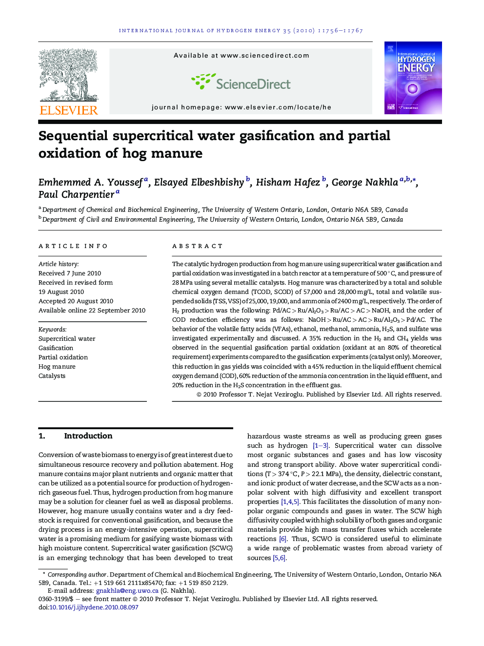 Sequential supercritical water gasification and partial oxidation of hog manure