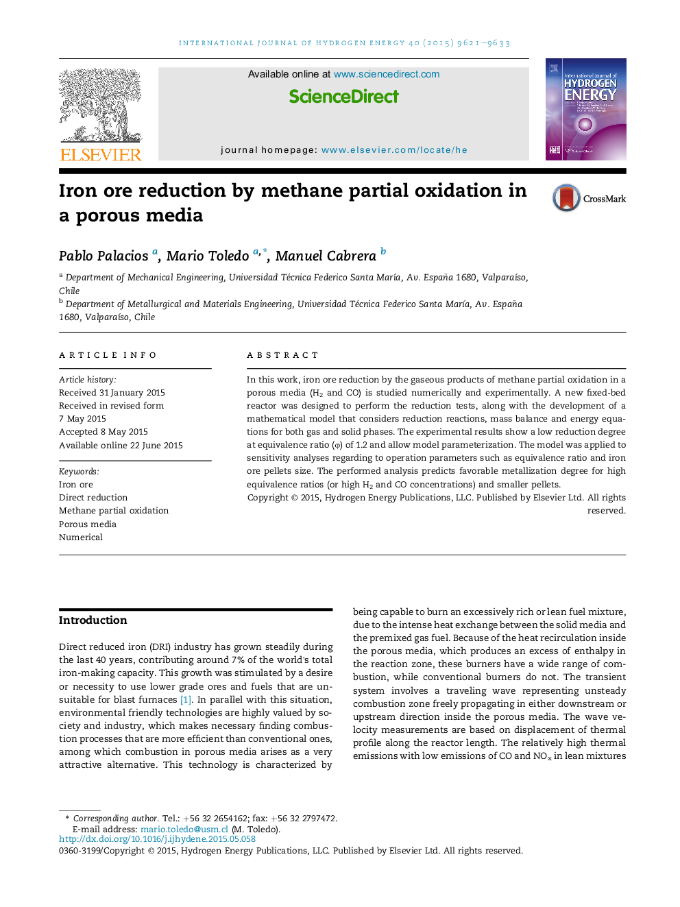 Iron ore reduction by methane partial oxidation in a porous media