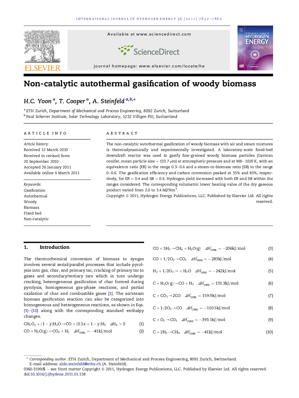 Non-catalytic autothermal gasification of woody biomass