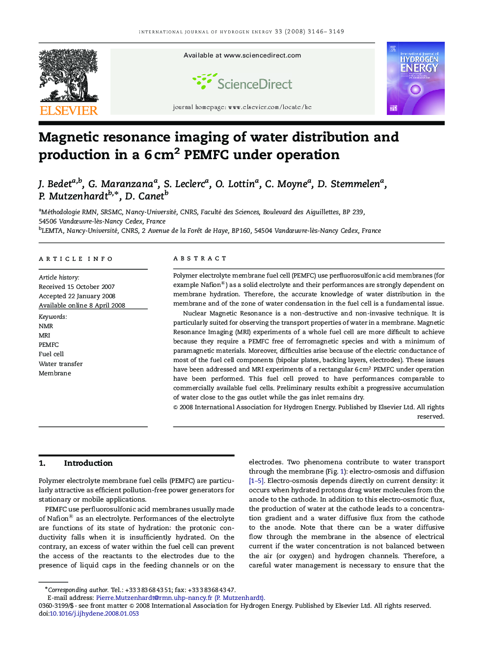 Magnetic resonance imaging of water distribution and production in a 6 cm2 PEMFC under operation