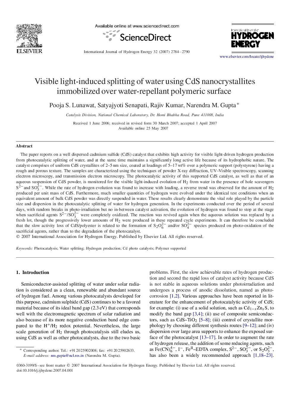 Visible light-induced splitting of water using CdS nanocrystallites immobilized over water-repellant polymeric surface