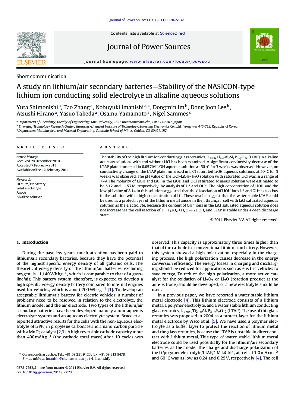 A study on lithium/air secondary batteries—Stability of the NASICON-type lithium ion conducting solid electrolyte in alkaline aqueous solutions