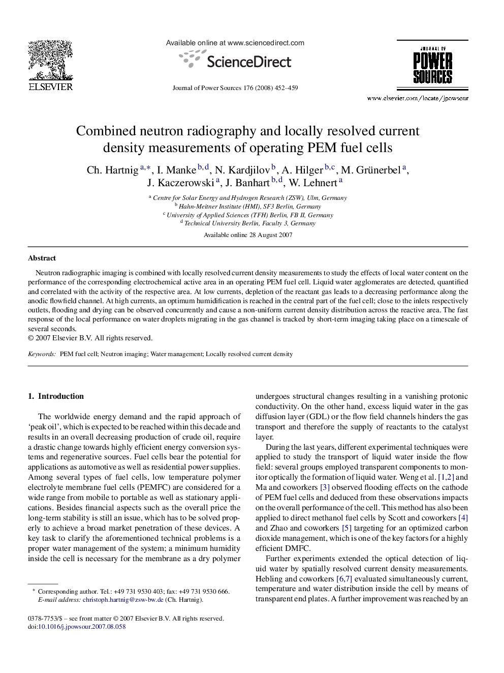 Combined neutron radiography and locally resolved current density measurements of operating PEM fuel cells