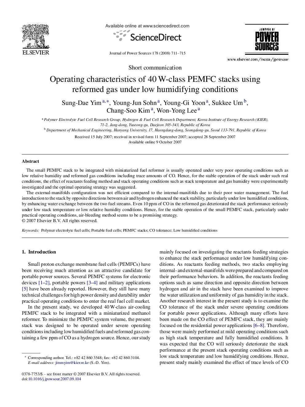 Operating characteristics of 40 W-class PEMFC stacks using reformed gas under low humidifying conditions