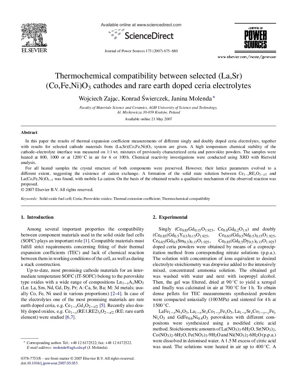 Thermochemical compatibility between selected (La,Sr)(Co,Fe,Ni)O3 cathodes and rare earth doped ceria electrolytes