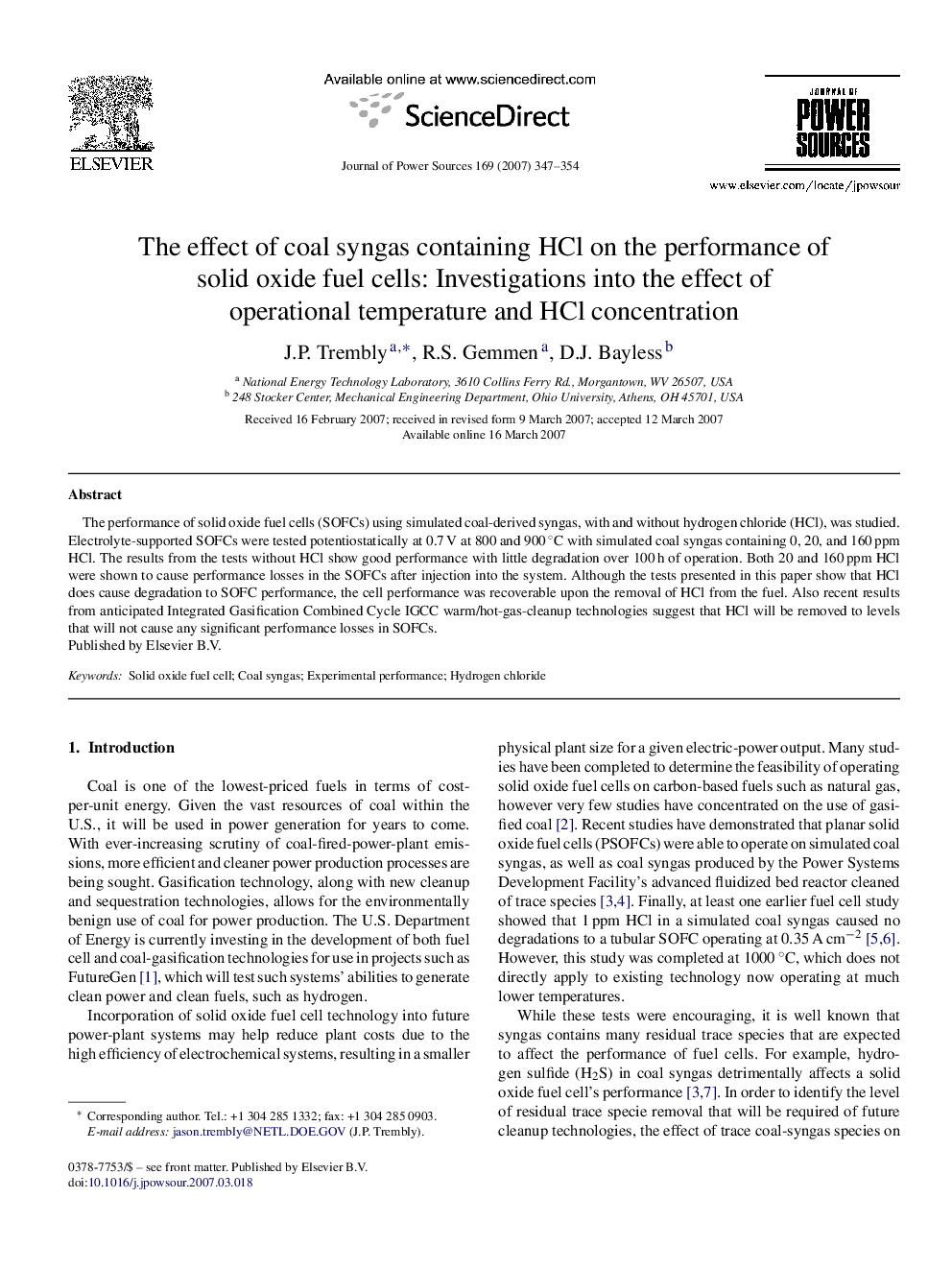 The effect of coal syngas containing HCl on the performance of solid oxide fuel cells: Investigations into the effect of operational temperature and HCl concentration