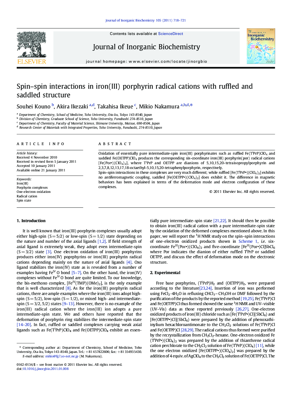 Spin–spin interactions in iron(III) porphyrin radical cations with ruffled and saddled structure