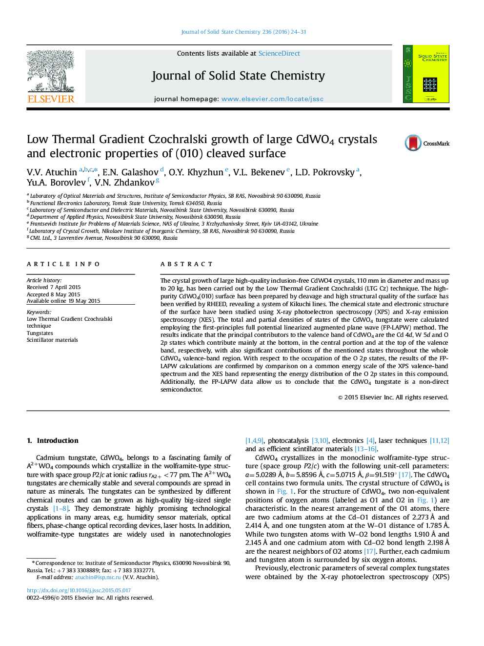 Low Thermal Gradient Czochralski growth of large CdWO4 crystals and electronic properties of (010) cleaved surface