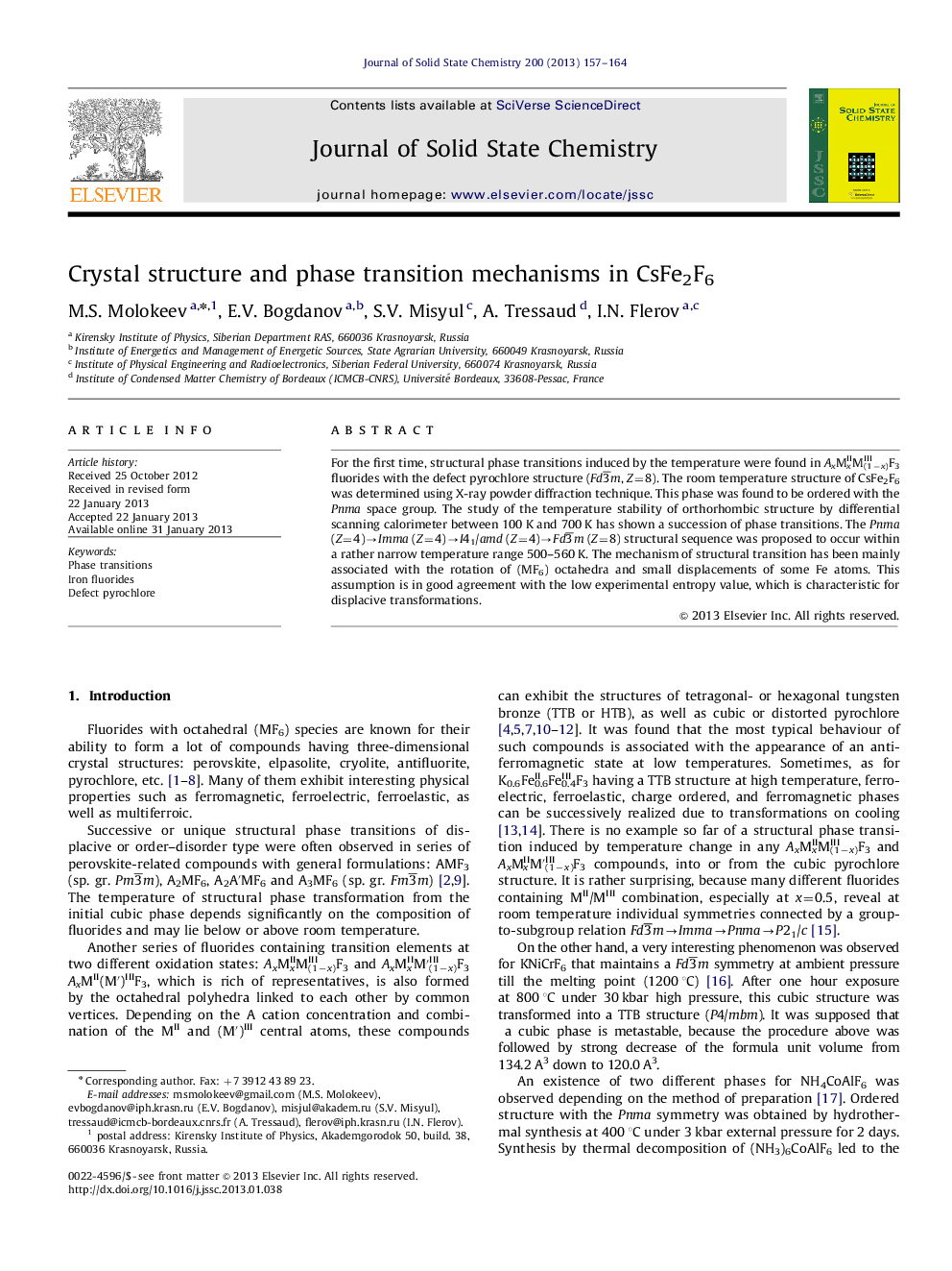 Crystal structure and phase transition mechanisms in CsFe2F6