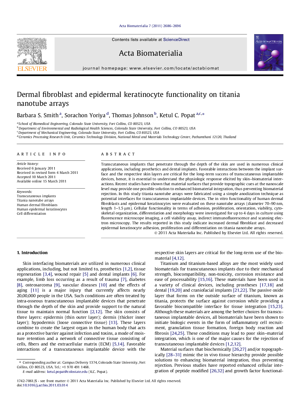 Dermal fibroblast and epidermal keratinocyte functionality on titania nanotube arrays