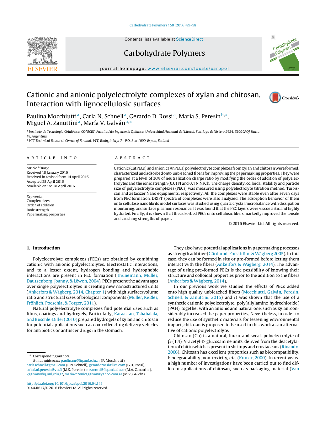 Cationic and anionic polyelectrolyte complexes of xylan and chitosan. Interaction with lignocellulosic surfaces