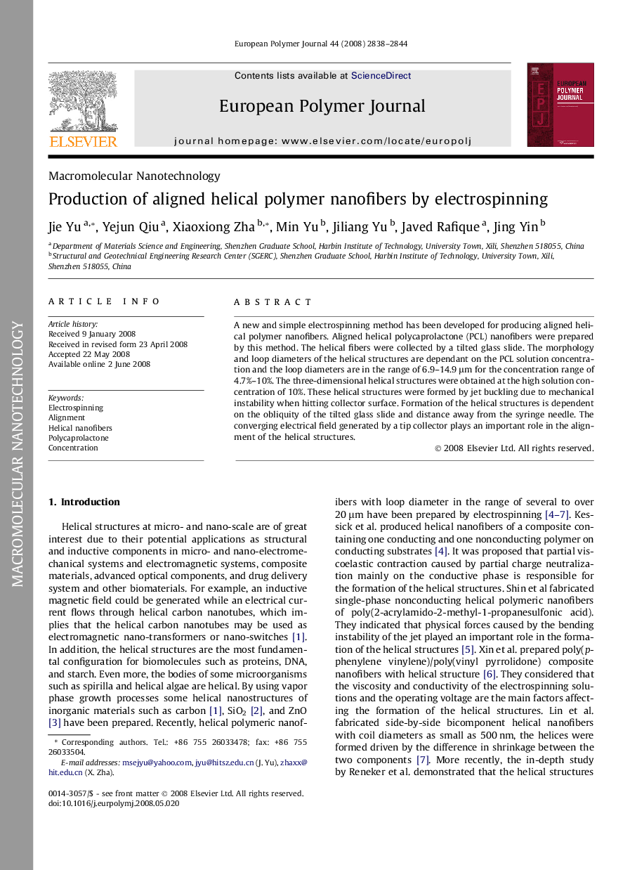 Production of aligned helical polymer nanofibers by electrospinning