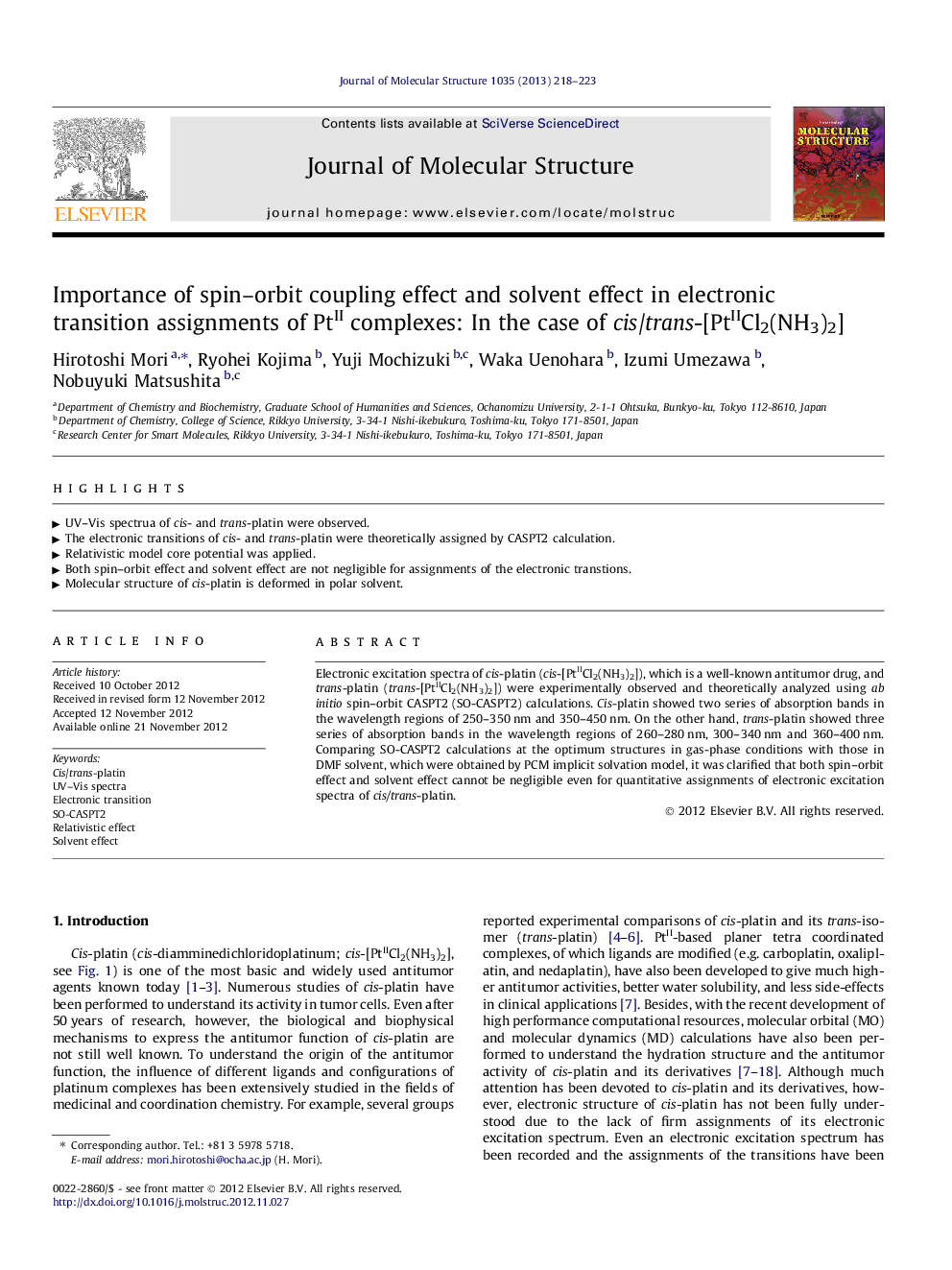 Importance of spin–orbit coupling effect and solvent effect in electronic transition assignments of PtII complexes: In the case of cis/trans-[PtIICl2(NH3)2]