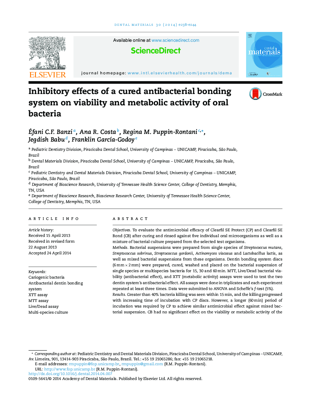 Inhibitory effects of a cured antibacterial bonding system on viability and metabolic activity of oral bacteria