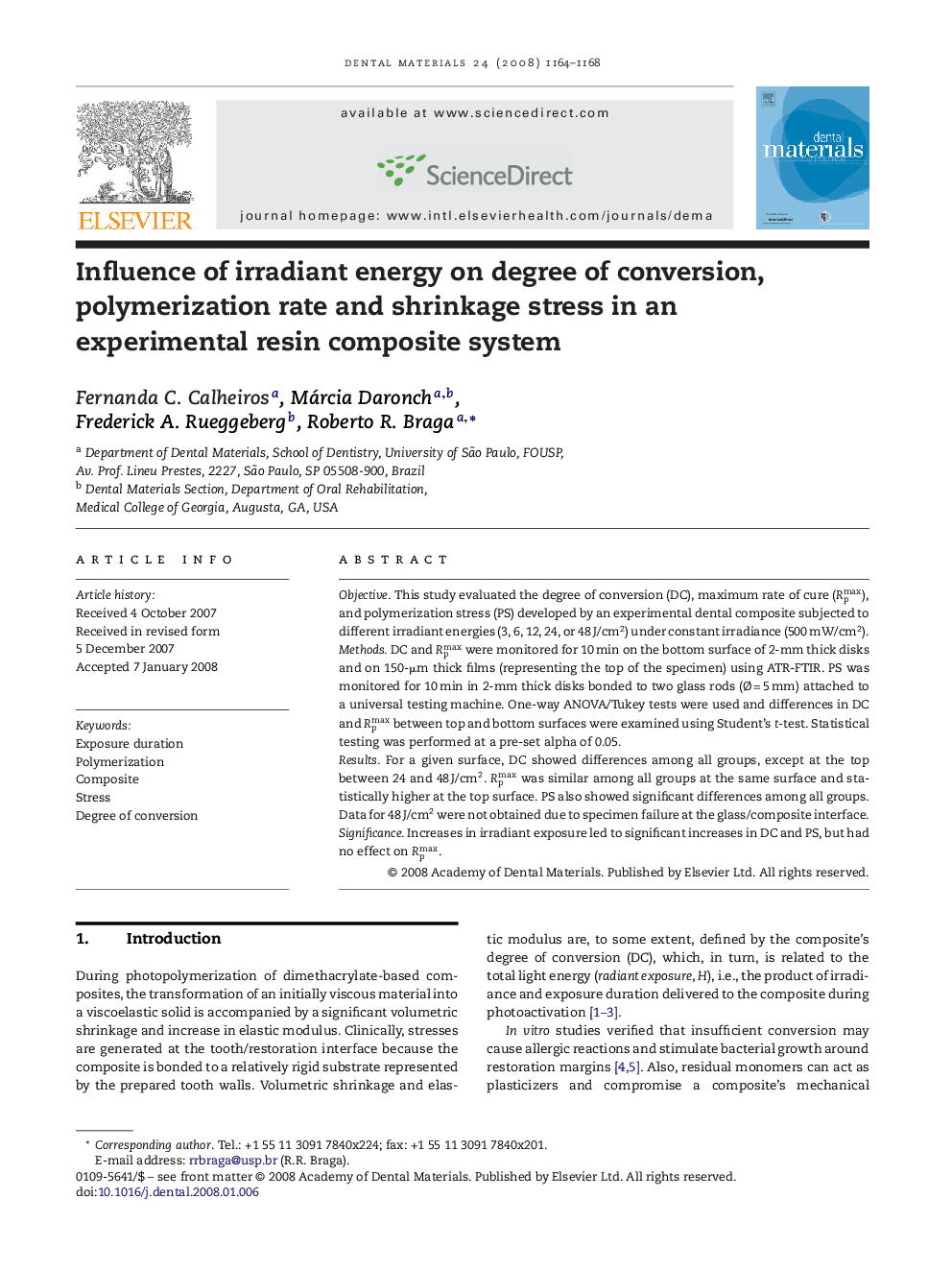 Influence of irradiant energy on degree of conversion, polymerization rate and shrinkage stress in an experimental resin composite system