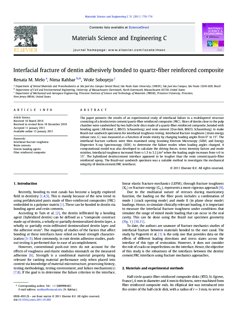 Interfacial fracture of dentin adhesively bonded to quartz-fiber reinforced composite