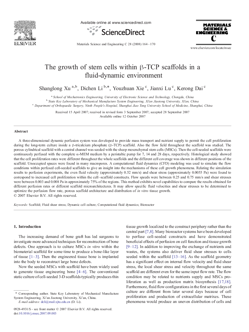 The growth of stem cells within β-TCP scaffolds in a fluid-dynamic environment