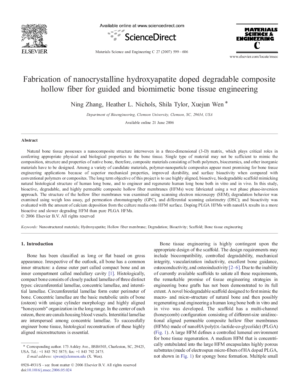 Fabrication of nanocrystalline hydroxyapatite doped degradable composite hollow fiber for guided and biomimetic bone tissue engineering