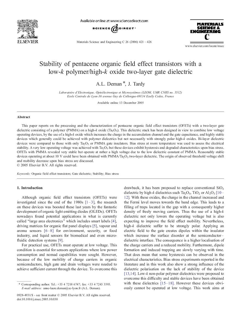 Stability of pentacene organic field effect transistors with a low-k polymer/high-k oxide two-layer gate dielectric